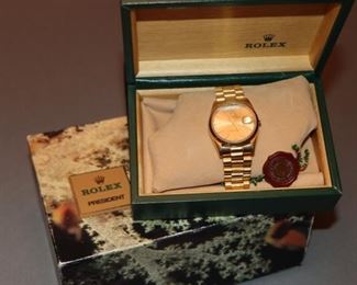 Men’s President (Rolex) 18kt gold with box, no papers, but original identification tag, and missing winding stem. Requires Rolex service. Authentic.  (Replace stem and service cost aaprox. $4,500-$6,000.00) Priced based on this needed service. Watch is fully repairable and is not priced as a bargain scrap item.  