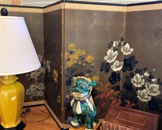 Four panel Asian screen; bright yellow lamp