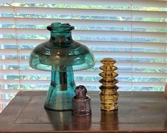 Vintage colorful glass insulators (Glass Insulators are those glass things you might see on the tops and cross-arms of telephone poles.)