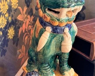 One of two colorful foo dogs