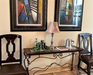 Entry table with glass insert top; two of eight dining chairs