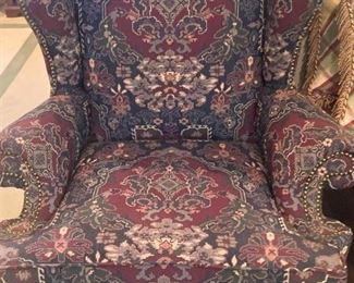 Nail head trimmed wingback chair
