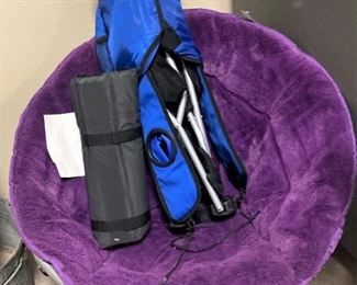 Child's purple chair; blue folding chair