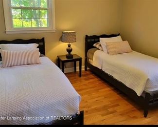 Twin beds, wood. Mattresses are not included