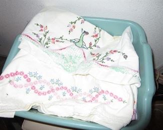 Bin of embroidery pillow shams for standard pillows