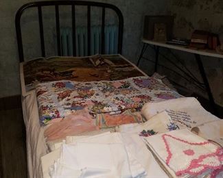 Fine linens & metal bed