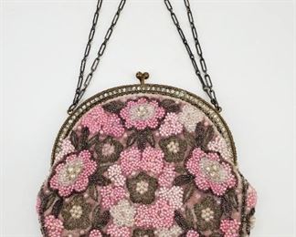 Fine Antique French Parisian Pink BeadeHand made by Marion, 33 Rue Saint Roch, Paris, circa 1920s. Beaded with pink and crystal beads and faux pearls, and embroidered with metallic thread. Original label is sewn to the lining, and the frame is stamped Made in France. d Purse Bag. 