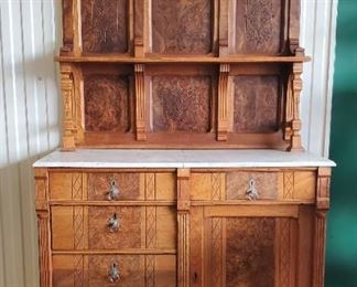 Antique Furniture including this Eastlake marble top sideboard with carved birds crest