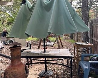 outdoor table with double umbrella 