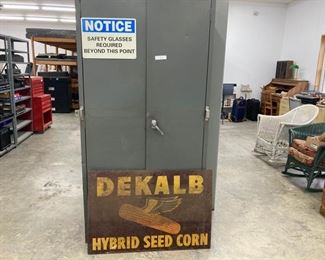 Vintage storage cabinet and advertising sign
