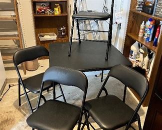 Brand new - just out if the box for pictures card table and 4 chairs 