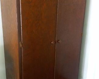Tall storage cabinet with shelves  $100