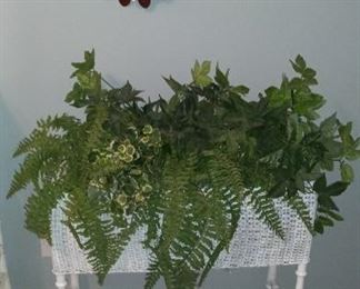 Wicker plant stand and artificial ferns  $50                                 Red, white and blue decor $8