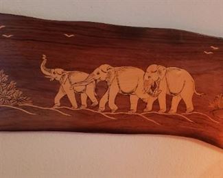 Wood plaque inlaid with elephants