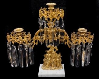 ANTIQUE TRI GIRANDOLE CANDELABRA WITH CRYSTAL PRISMS AND MARBLE BASE.  Condition: Some of the hanging prisms have chips. Two prisms have top chipped/not hangable, or missing. Spaces for five prisms