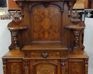 American Aesthetics walnut sideboard in the style of a French hunt cabinet.  Late 19th century. In the manner of  Pottier & Stymus or  Herter Brothers