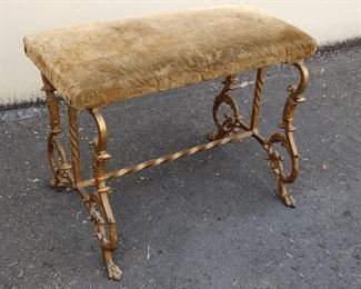 DECO GOTHIC REVIVAL BEDROOM BENCH WITH SCROLL WORK CAST IRON BASE AND UPHOLSTERED SEAT . IN THE MANNER OF OSCAR BACH