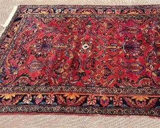 HAND KNOTTED WOOL RUG. 6'5" x 4'11"