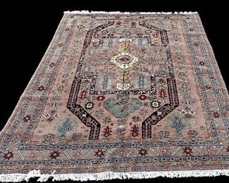 HAND KNOTTED RUG. 6'8" X 9'10"