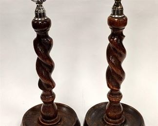 TWO ENGLISH OAK BARLEY TWIST CANDLE HOLDERS. 11.75" TALL. Condition: chip on one foot,