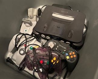 Nintendo 64 console, 3 controllers, and accessories.