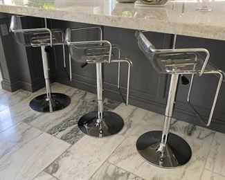 Acrylic adjustable counter stools                                           One stool needs adjustment