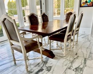  Inlaid Italian iron trestle dining table with 6 painted embossed leather chairs                                                                                                                                       