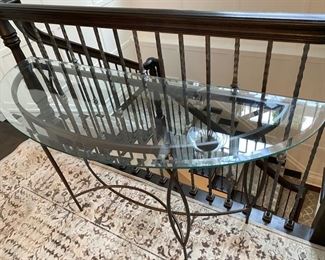 Iron & glass console table       28.5"h x 52"w x 18"d