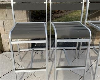 6 Aluminum and wood bar stools $600.00