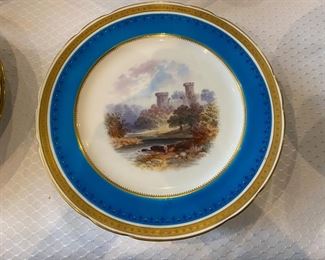  8 pc 9” plates with various scenes 