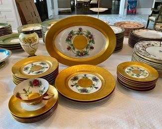 Heinrich & Co. Gold bordered floral china $250.00         1 platter, 7 8" plates, 2 10" dinner plates (some burnishing to gilding), 8 61/2" plates, 1 cup, 5 saucers