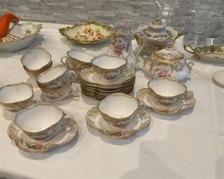 Dainty floral tea cups, saucers creamer & sugar 