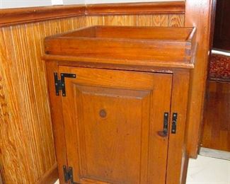 Unique Oak Square Cabinet    ($60)
This vintage rustic cabinet lends warmth and style to any room. Bring a look of charm and authenticity to your space with this gorgeous piece made from solid oak and strong, sturdy construction.
The authentic Colonial-Era Hand-Forged H-L Style Hinges alone are enough to make this hutch a conversation piece. 
Designed to afford the greatest amount of storage in a small space, and built to stand up to heavy use, this early 19th century furniture proves to be a handsome, handy addition to homes today.
