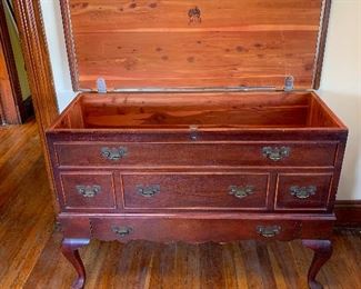 Beautiful Large Lane Antique Cedar Hope Chest  ($60)
Queen Ann Style Cedar Chest
44ʺW × 18.5ʺD× 31.5ʺH
Mid Century design cedar chest by Lane of Altavista, Virginia, USA, 1960's. 
Made from walnut, lined in cedar. Features a lower drawer for additional storage.
Excellent, vintage condition. There is a water mark on the lid. Original latch in place. Structurally sound, solid, sturdy and in excellent condition. 
Lane Company cedar chests were a coveted home item from their inception in 1912 until the company closed in 2001 after 89 years on the market. Also called a "hope chest," these beauties came in a variety of styles across the years. 
As an added bonus, a mini Lane Cedar (jewelry) chest will be included with your purchase!