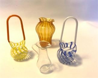 Delicate hand-blown miniature glass vases (Set of 4)
$20

One tiny glass vases in vibrant orange. Two lovely blue and yellow striped delicate baskets with thin elegant handles. Includes one miniature clear glass pitcher. All approximately 2.5" - 3" tall.


