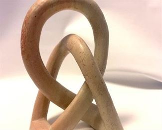 Double Mobius Sculpture
$30

6” tall

This hand carved sculpture, with its seamless smooth surface represents the universal symbol of love and strength. 

The clean lines of its smooth shape gracefully twist into itself. Hand carved from a white soft stone with very interesting grain. This unique mobius shape looks completely different at every angle delicately flowing from a delicate double base. There is no label or marks on this piece regarding its origin or composition. 
