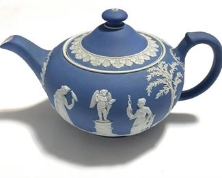 Vintage Wedgwood Blue Jasperware Teapot
$90

Antique Wedgwood Teapot in dark blue with white classical decoration. This piece is heavy stoneware, with jasper ware decoration all around. No chips or cracks. Beautiful piece!
Height: 5.5”
Length: 20” - handle to spout