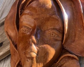 Would you just look at her face. Large leather hanging.