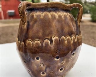This piece is from a potter with serious skill.