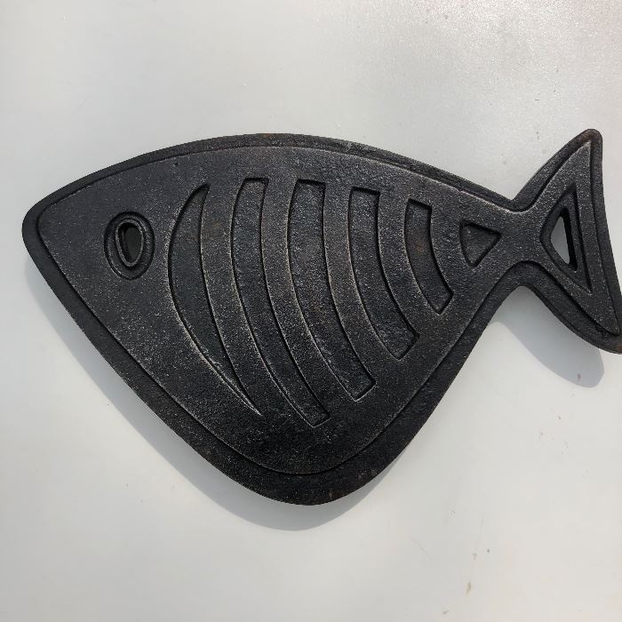 This is a KEEPER, mid century modern trivet. 