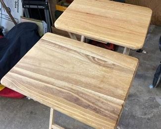 Two oak folding TV tables