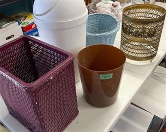 Assortment of waste baskets and beautiful metal decorative waste basket cover