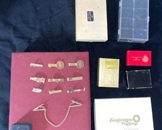 Men's tie clips and empty jewelry boxes