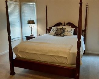 Elegant master bedroom suite 4 post bed 