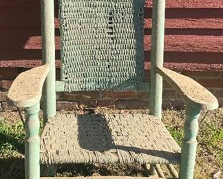 Old Green Paint Wicker Porch Rocker