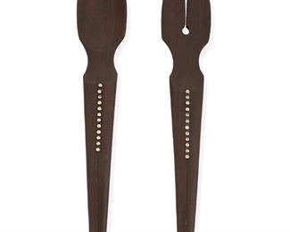 1010
A William Spratling Ebony Salad Serving Set
William Spratling (1900-1967)
Circa 1951-1967, Third Design Period; Taxco, Mexico
Each stamped for William Spratling and sterling
An ebony spoon and split fork salad set with twelve inset sterling silver balls to tapering handle, 2 pieces

Each: 10.375"
3.390 gross oz. troy approximately
Estimate: $800 - $1,200