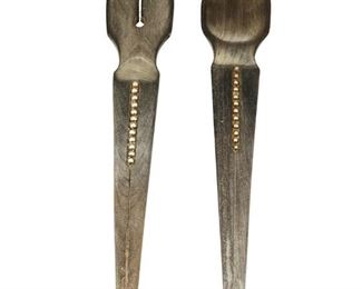 1013
A William Spratling Ebony Salad Serving Set
William Spratling (1900-1967)
Circa 1951-1967, Third Design Period; Taxco, Mexico
Each stamped for William Spratling and sterling
An ebony spoon and split fork salad set with twelve inset sterling silver balls to tapering handle, 2 pieces

Each: 10.375" L
3.810 gross oz. troy approximately
Estimate: $800 - $1,200