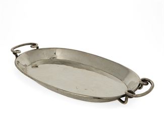 1021
A William Spratling Sterling Silver Tray
William Spratling (1900-1967)
Circa 1931-1946, First Design Period; Taxco, Mexico
Stamped for William Spratling and sterling
A sterling silver oval raised rim tray with scrolled handles

1" H x 7" W x 13.25" D
18.915 oz. troy approximately
Estimate: $400 - $600