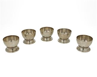 1038
A Set Of William Spratling Sterling Silver Raised Bowls
William Spratling (1900-1967)
Circa 1931-1946, First Design Period; Taxco, Mexico
Each stamped for William Spratling and sterling
Individual silver bowls with rope design on a raised foot, 5 pieces

Each: 2" H x 2.625" Dia.
22.210 oz. troy approximately
Estimate: $400 - $600