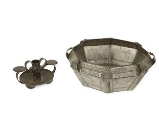 1047
Two William Spratling Tin Table Items
WIlliam Spratling (1900-1967)
Circa 1931-1944, First Design Period; Taxco, Mexico
Each stamped for William Spratling; Further stamped: Taxco / Mexico
Comprising a candlestick with small domed feet and an octagonal serving bowl with decorative stamping and curved ruffled applied decoration, 2 pieces

Bowl: 3.25" H x 7.875" Dia.; Candlestick: 2.5" H x 5" W
Estimate: $400 - $600